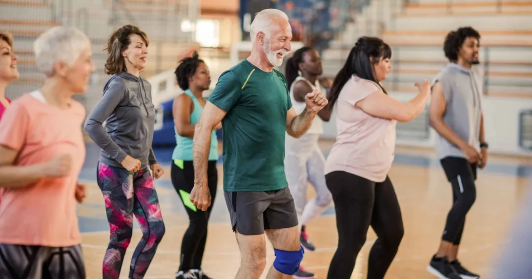Group of people in a zumba class Group of people in a zumba class