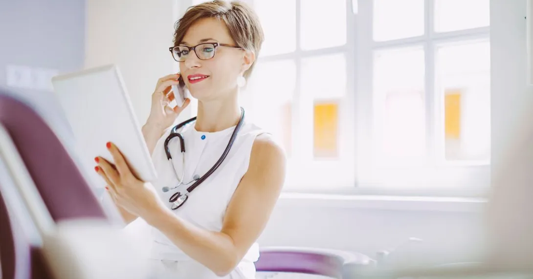   Healthcare provider looking at a tablet